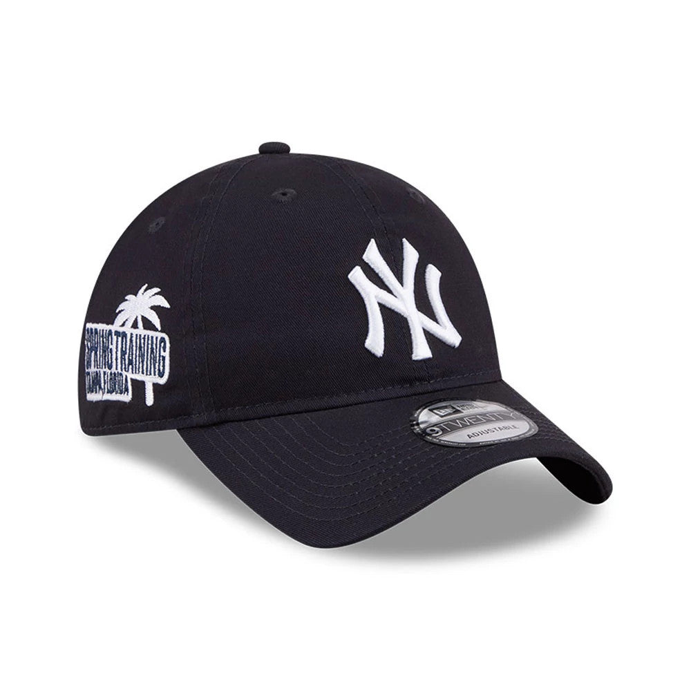 Yankees MLB Colours Navy New Era 9TWENTY Adjustable Cap, three-quarter view showing the white raised embroidered NY logo on the front panel, with an embroidered Spring Training Florida graphic on the right side.