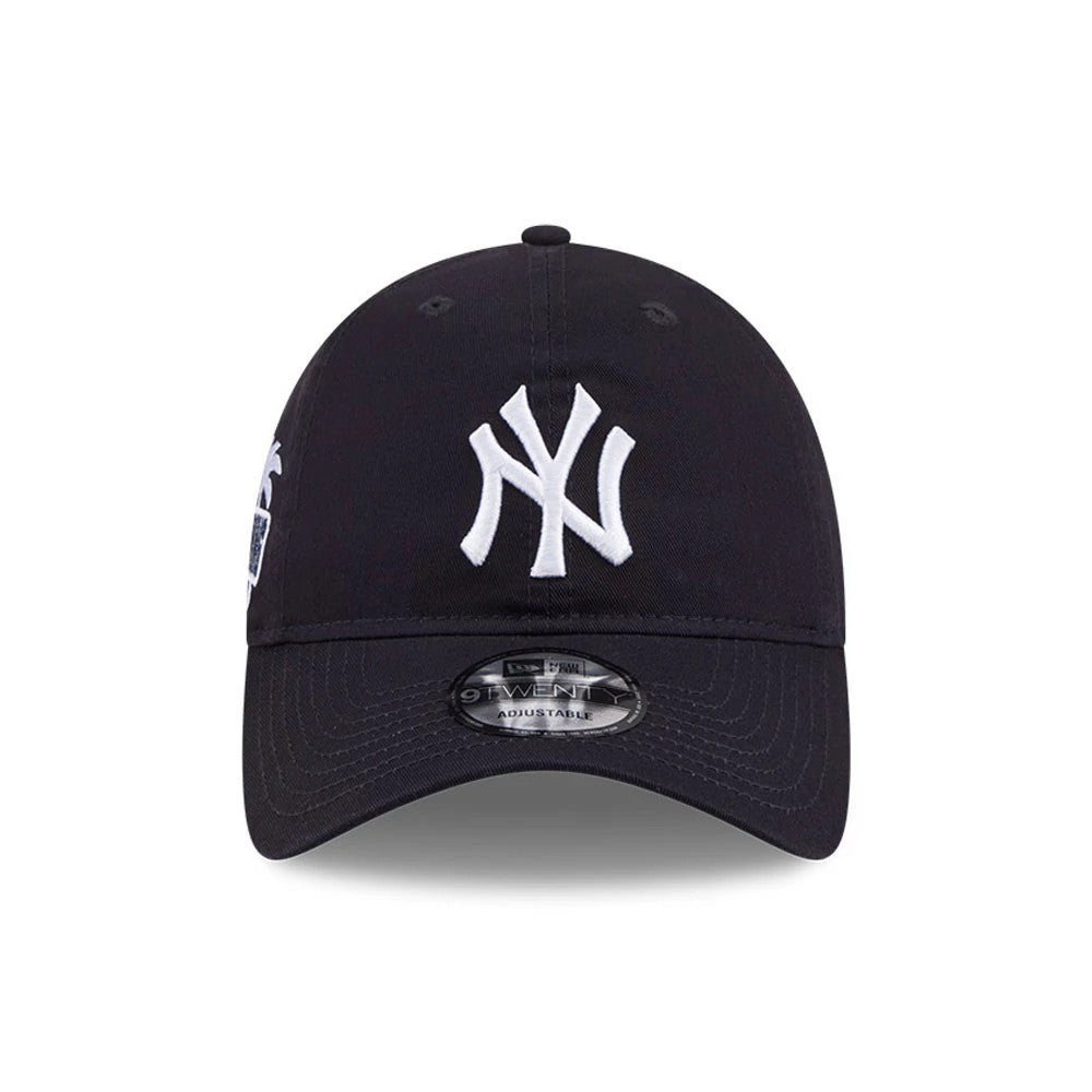 Yankees MLB Colours Navy New Era 9TWENTY Adjustable Cap, front view showing the raised white NY Yankees logo on the structured navy crown with a curved navy visor and a 9TWENTY size sticker.