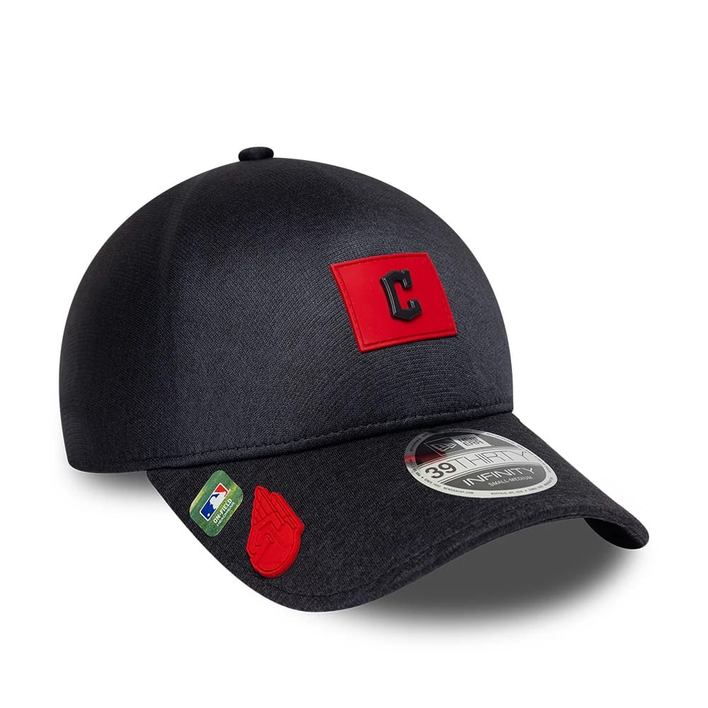Cleveland Guardians MLB Clubhouse Navy New Era 39THIRTY Infinity Stretch Fit Cap, three-quarter view showing a red raised embroidered Guardians patch on the front panel, with a curved visor and 39THIRTY size sticker.