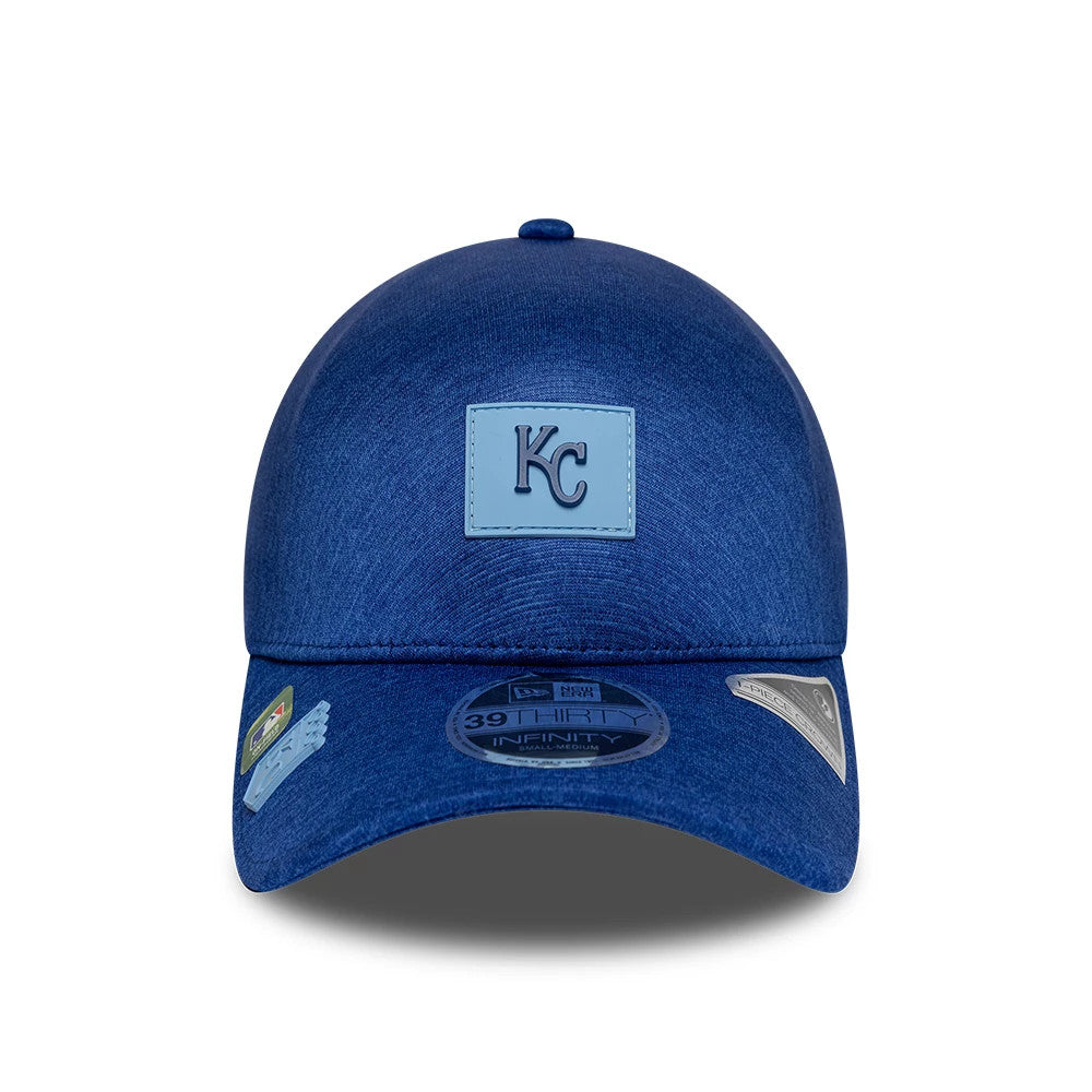 Kansas City Royals MLB Clubhouse Blue New Era 39THIRTY Infinity Stretch Fit Cap, front view showing raised blue KC patch on the structured crown, blue curved visor with 39THIRTY size sticker and additional holographic decal.