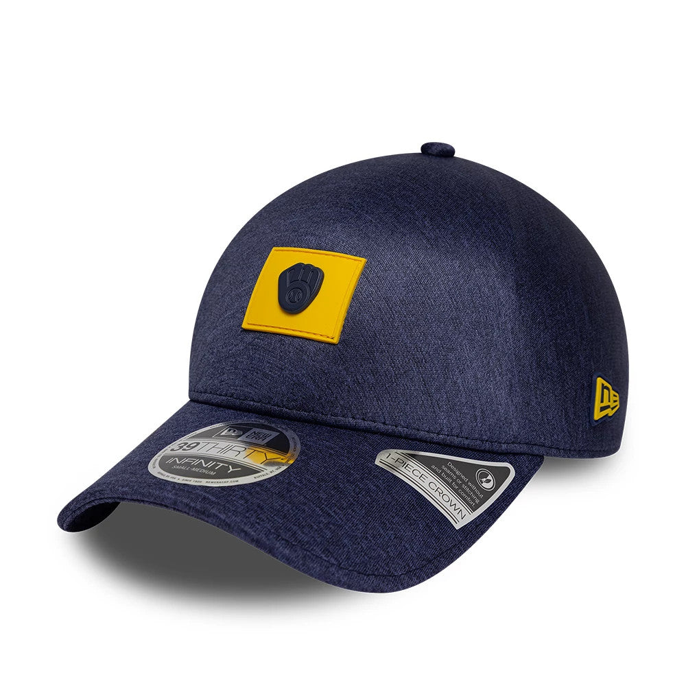 Milwaukee Brewers MLB Clubhouse Navy New Era 39THIRTY Infinity Stretch Fit Cap, three-quarter view showing a black and yellow Brewers logo on the front panel, a curved navy visor with a 39THIRTY size sticker.