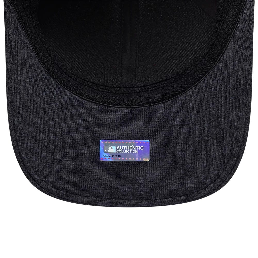 LA Angels MLB Clubhouse Black New Era 39THIRTY Infinity Stretch Fit Cap, inside view showing a black sweatband and taping, with an Authentic Collection sticker centred on the black undervisor.