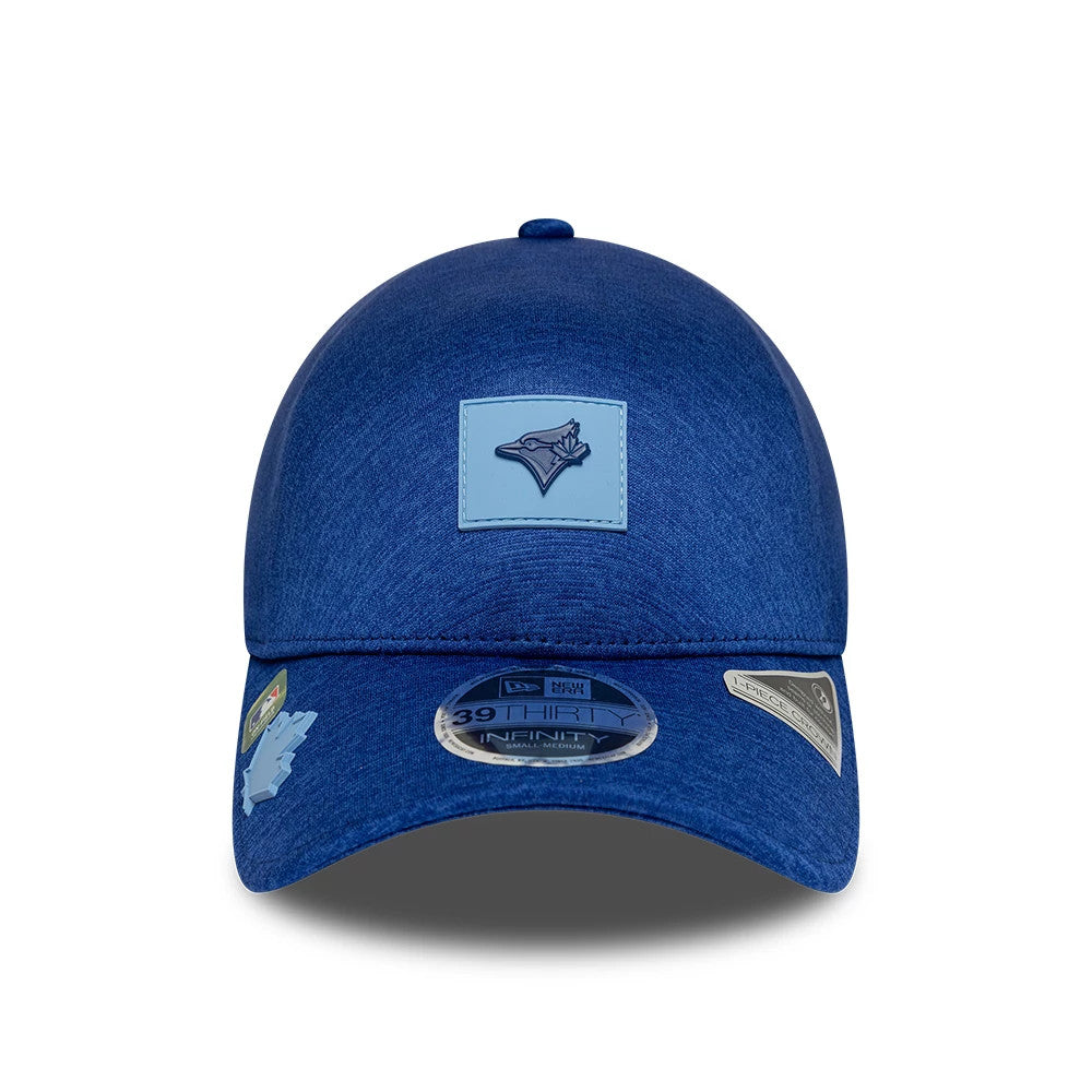 Toronto Blue Jays MLB Clubhouse Blue New Era 39THIRTY Infinity Stretch Fit Cap, front view showing the blue team logo patch on the front panel, blue curved visor with 39THIRTY size sticker and geometric sticker accents.