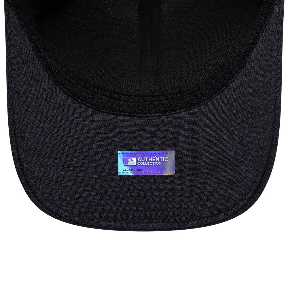Washington Nationals MLB Clubhouse Black New Era 39THIRTY Infinity Stretch Fit Cap, inside view showing the black undervisor with an Authentic Collection sticker and black taping along the seams.