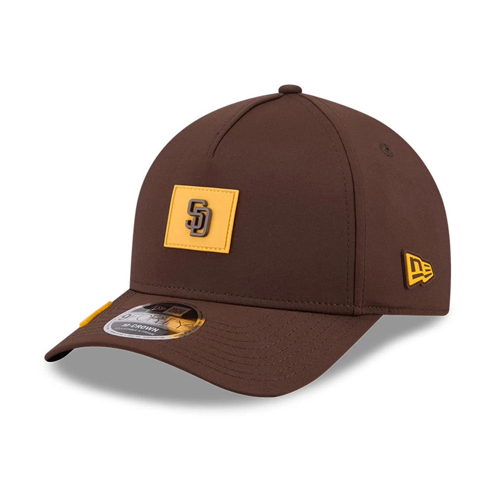 San Diego Padres MLB Clubhouse Dark Brown New Era 9FORTY M-Crown A-Frame Adjustable Cap, three-quarter view showing a yellow patch with the SD logo on the front panel, a gold New Era flag logo on the left side.