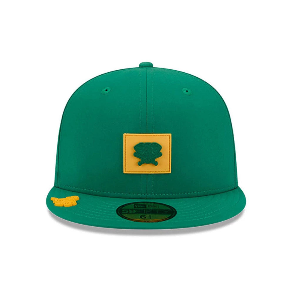 Athletics MLB Clubhouse Dark Green New Era 59FIFTY Fitted Cap, front view showing a yellow square logo with green embroidery on the front panel, a flat dark green visor with a 59FIFTY size sticker, and a small yellow embellishment on the visor edge.