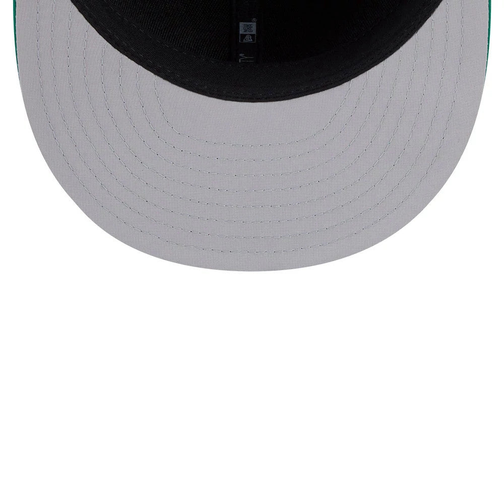 Athletics MLB Clubhouse Dark Green New Era 59FIFTY Fitted Cap, inside view showing the black sweatband, New Era branded taping along the seams, and a grey undervisor beneath the structured flat visor.