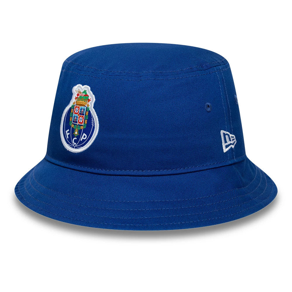 New Era FC Porto Core Blue Tapered Bucket Hat, front view showing the FC Porto club crest in full colour on the front panel, with blue eyelets and a white New Era flag logo on the side.