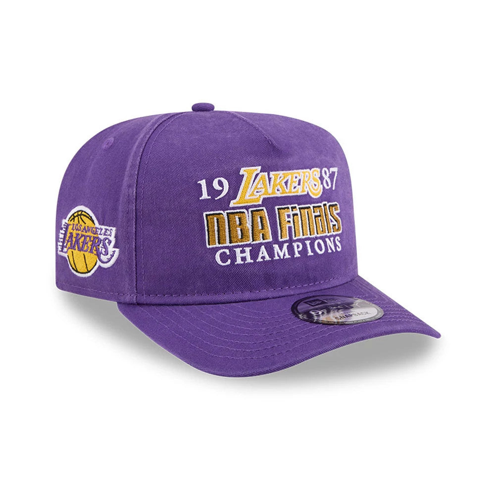 LA Lakers NBA Historic Purple New Era 9FIFTY A-Frame Snapback Adjustable Cap, front view showing yellow and white embroidered logos and text on the purple crown with a matching visor, and a 9FIFTY size sticker on the visor.