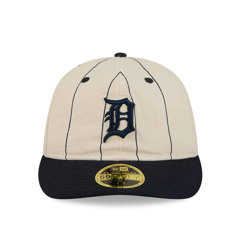 Detroit Tigers MLB Linen Cream Retro Crown New Era 59FIFTY Fitted Cap, front view showing the dark navy embroidered Tigers logo on the cream panels with navy pinstripes, a black visor, and the gold 59FIFTY size sticker.