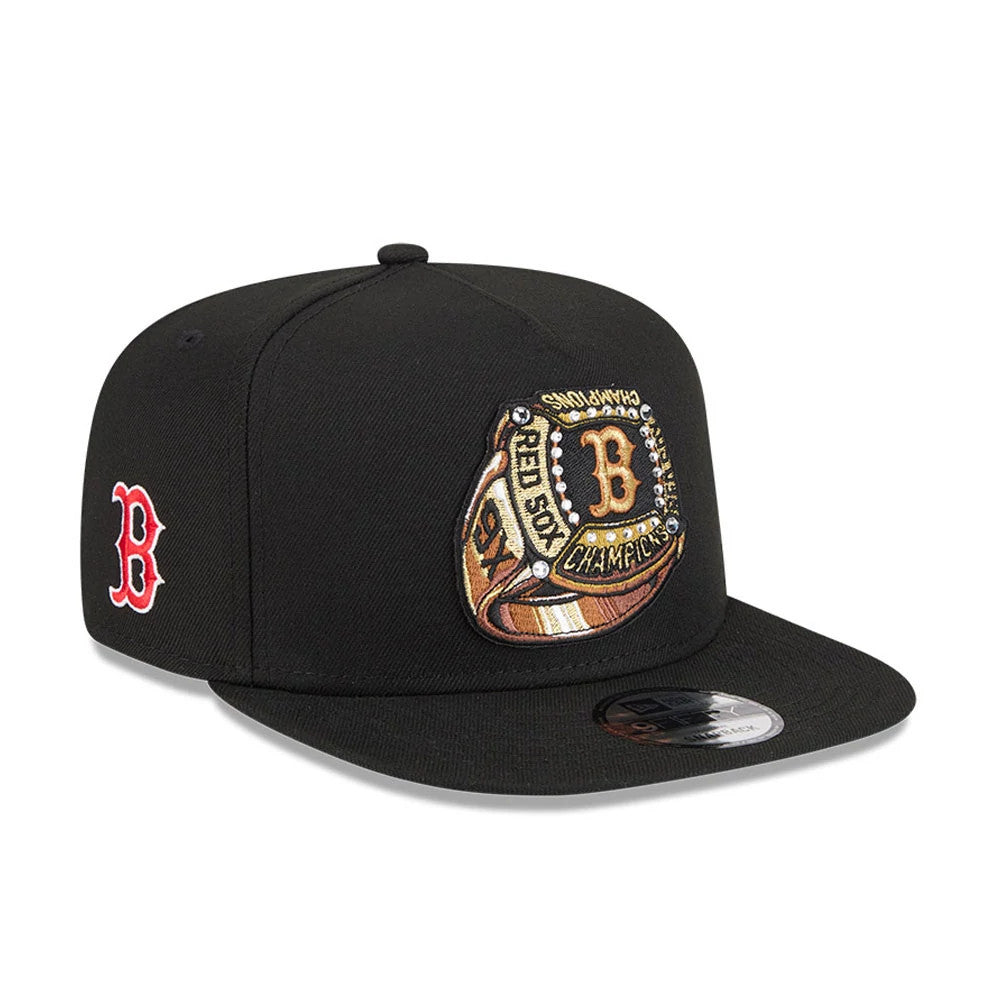 Boston Red Sox MLB Ring Black New Era 9FIFTY A-Frame Snapback Adjustable Cap, three-quarter view with a large raised embroidered championship ring graphic on the front panel and a red B logo on the left side, featuring a curved black visor.