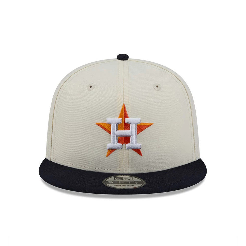 Houston Astros MLB Localized White New Era 9FIFTY Snapback Adjustable Cap, front view showing the raised embroidered orange and white Astros logo on the cream front panel, with a black visor and a 9FIFTY size sticker.