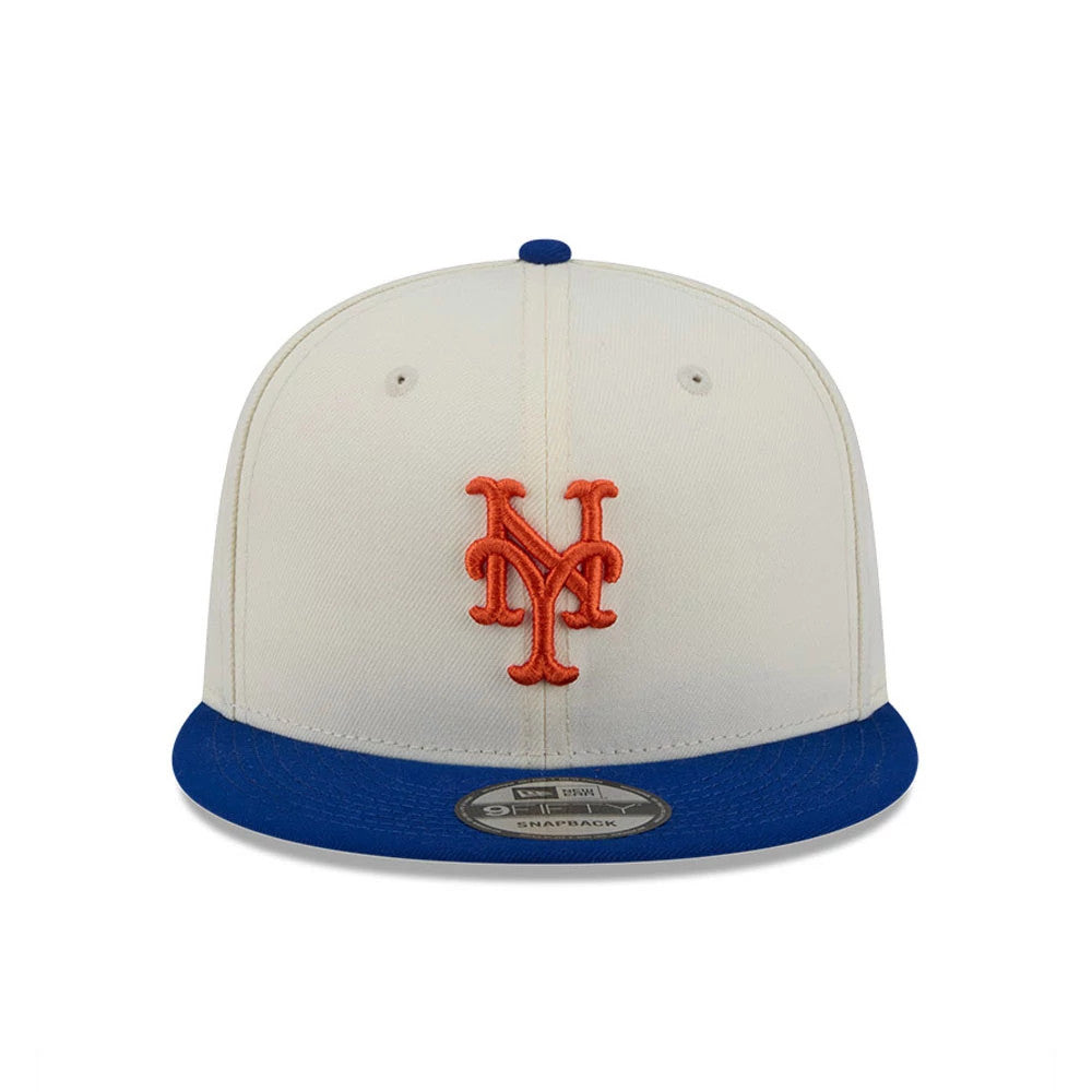 New York Mets MLB Localized White New Era 9FIFTY Snapback Adjustable Cap, front view showing the raised orange embroidered Mets logo on the structured white crown, with a blue flat visor and a 9FIFTY size sticker on the visor.