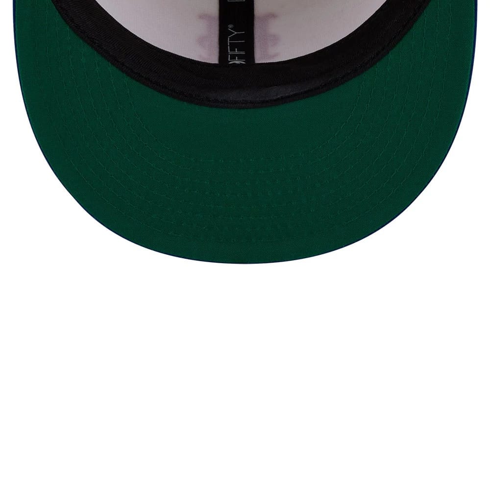 New York Mets MLB Localized White New Era 9FIFTY Snapback Adjustable Cap, inside view showing the green undervisor and black sweatband, with the New Era logo printed on the white interior taping.
