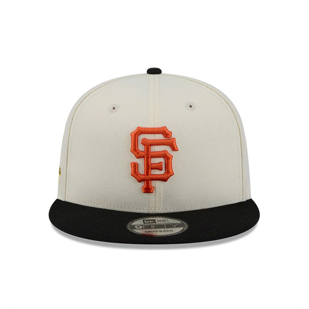San Francisco Giants MLB Localized White New Era 9FIFTY Snapback Adjustable Cap, front view showing the orange embroidered SF logo on the white crown, with a black visor and the 9FIFTY size sticker centred on top.