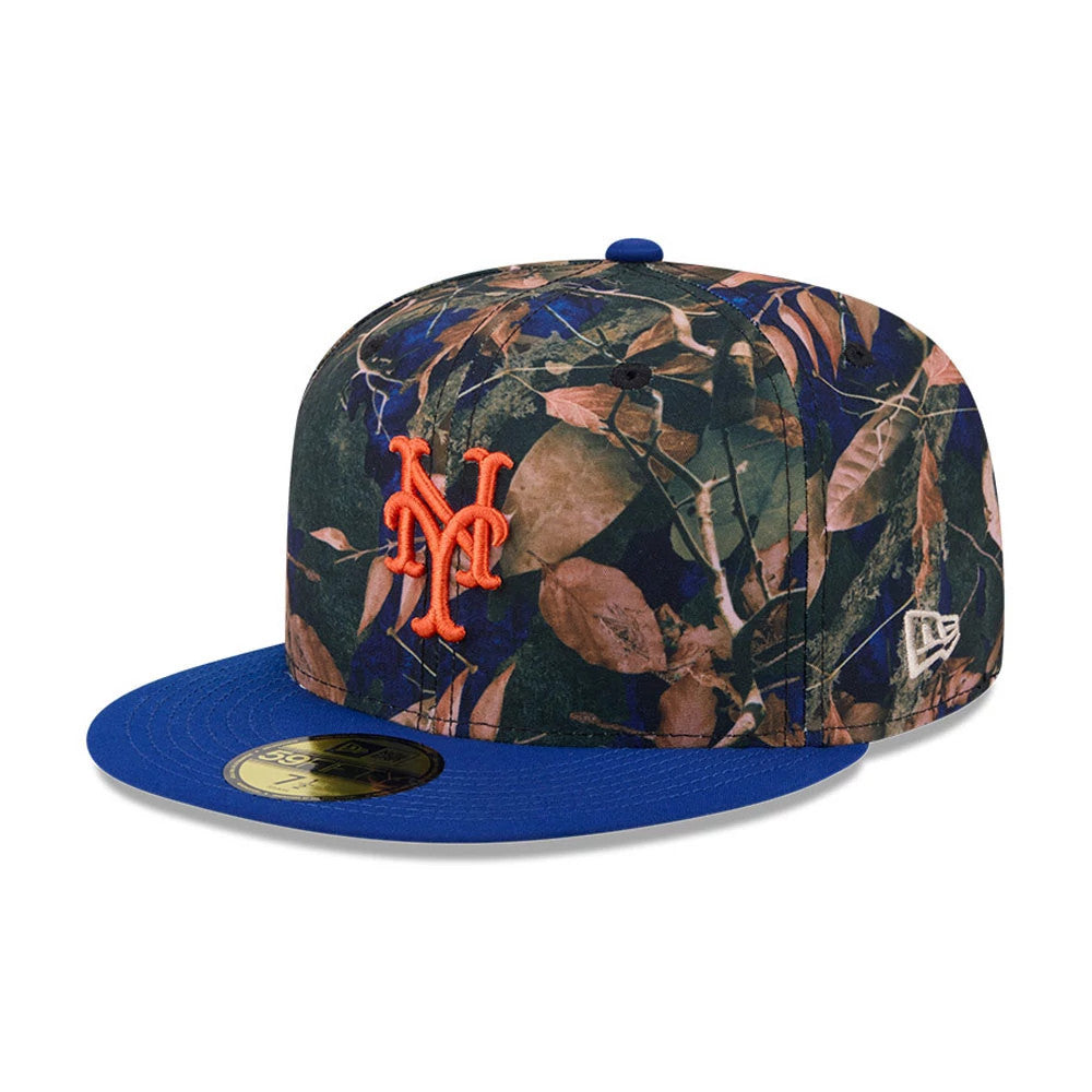 New York Mets MLB Leaves Blue New Era 59FIFTY Fitted Cap, three-quarter view showing raised orange Mets logo embroidered on the front panel, a leaves pattern on the crown, blue flat visor, and gold 59FIFTY size sticker.