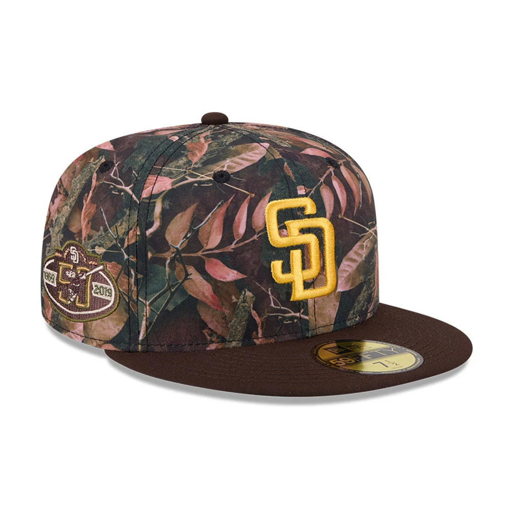 San Diego Padres MLB Leaves Dark Brown New Era 59FIFTY Fitted Cap, front view showing the raised yellow SD logo embroidered on the leaf-patterned front panel, with a dark brown visor, side patch and gold 59FIFTY size sticker.
