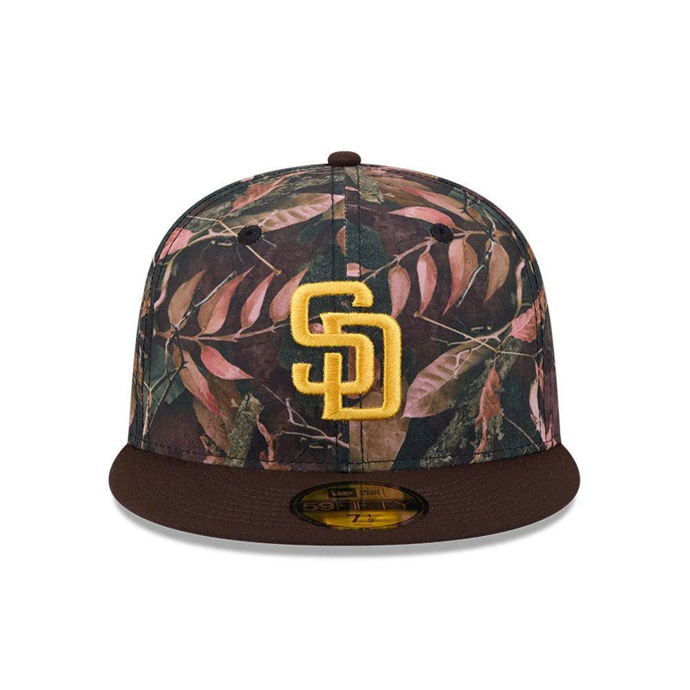 San Diego Padres MLB Leaves Dark Brown New Era 59FIFTY Fitted Cap, front view showing the gold embroidered SD logo on a lush leaves-patterned crown, with a dark brown visor and gold 59FIFTY size sticker.