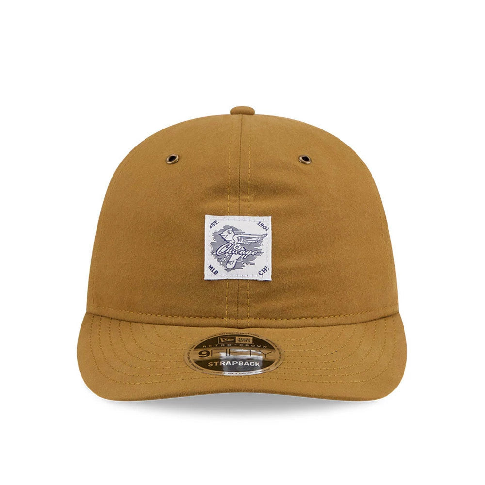 Chicago White Sox MLB Brushed Dark Beige Retro Crown New Era 9FIFTY Adjustable Cap, front view showing a white embroidered patch on the front panel, dark eyelets on the crown, a matching top button, and a gold 9FIFTY size sticker on the visor.