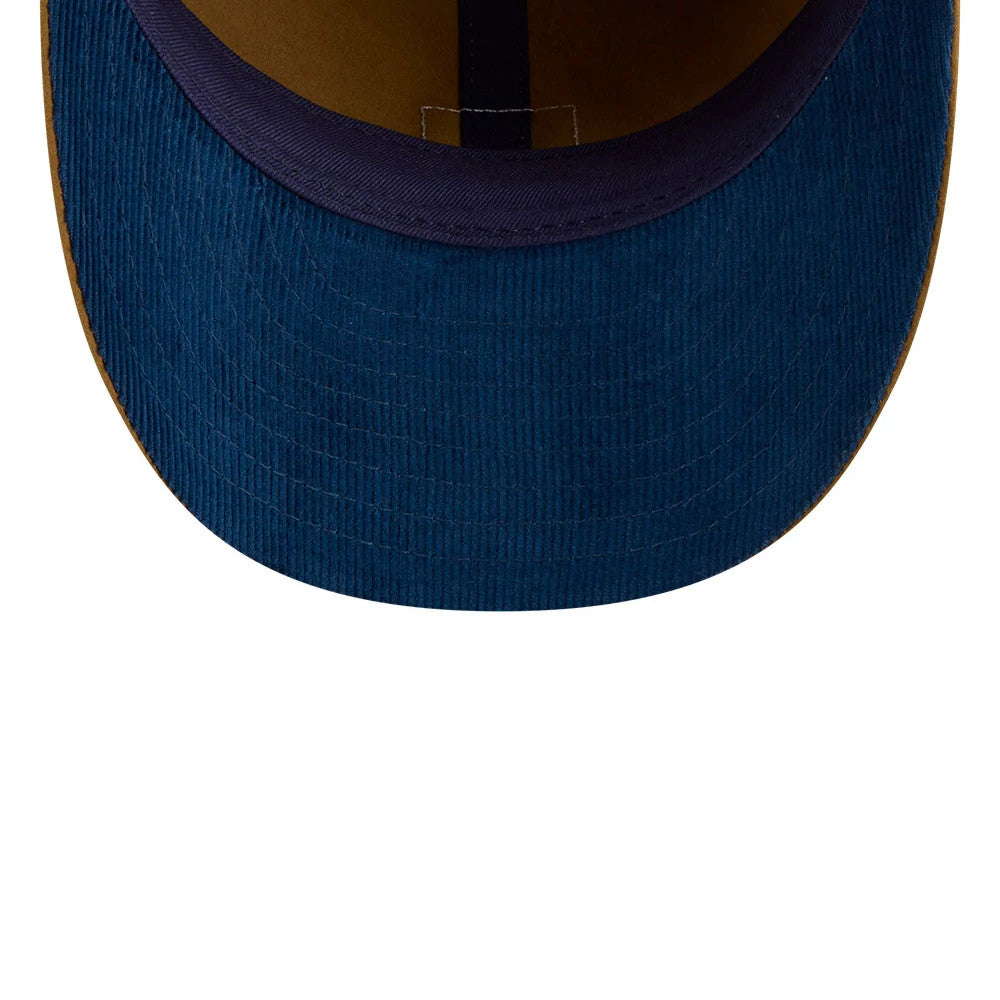 Chicago White Sox MLB Brushed Dark Beige Retro Crown New Era 9FIFTY Adjustable Cap, inside view showing the navy undervisor contrasted with a brown interior band and black taping along the centre seam.