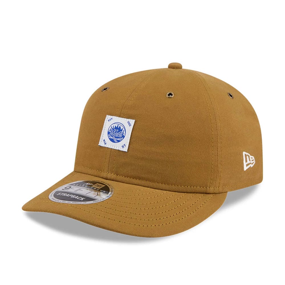 New York Mets MLB Brushed Dark Beige Retro Crown New Era 9FIFTY Adjustable Cap, front view showing a blue Mets patch on the front panel, a curved dark beige visor with a 9FIFTY size sticker, and the New Era flag logo on the left side.