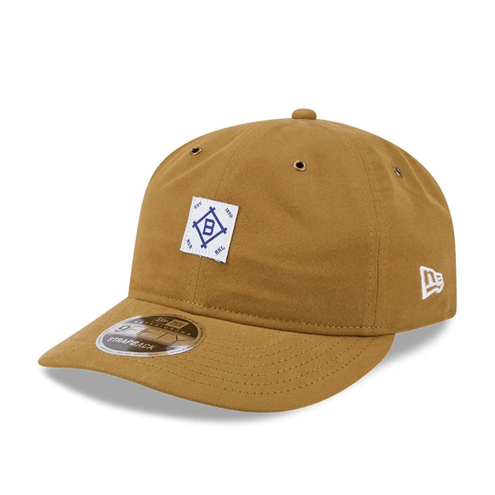 Brooklyn Dodgers MLB Brushed Dark Beige Retro Crown New Era 9FIFTY Adjustable Cap, three-quarter view showing a white embroidered Brooklyn Dodgers logo on the front panel, a curved visor with a 9FIFTY size sticker.