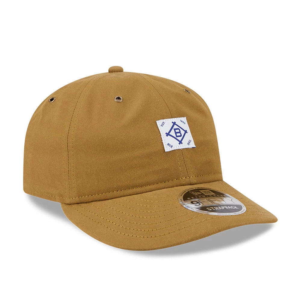 Brooklyn Dodgers MLB Brushed Dark Beige Retro Crown New Era 9FIFTY Adjustable Cap, front view showing a blue embroidered Dodgers logo on the front panel, dark beige curved visor with a 9FIFTY size sticker, and matching top button.