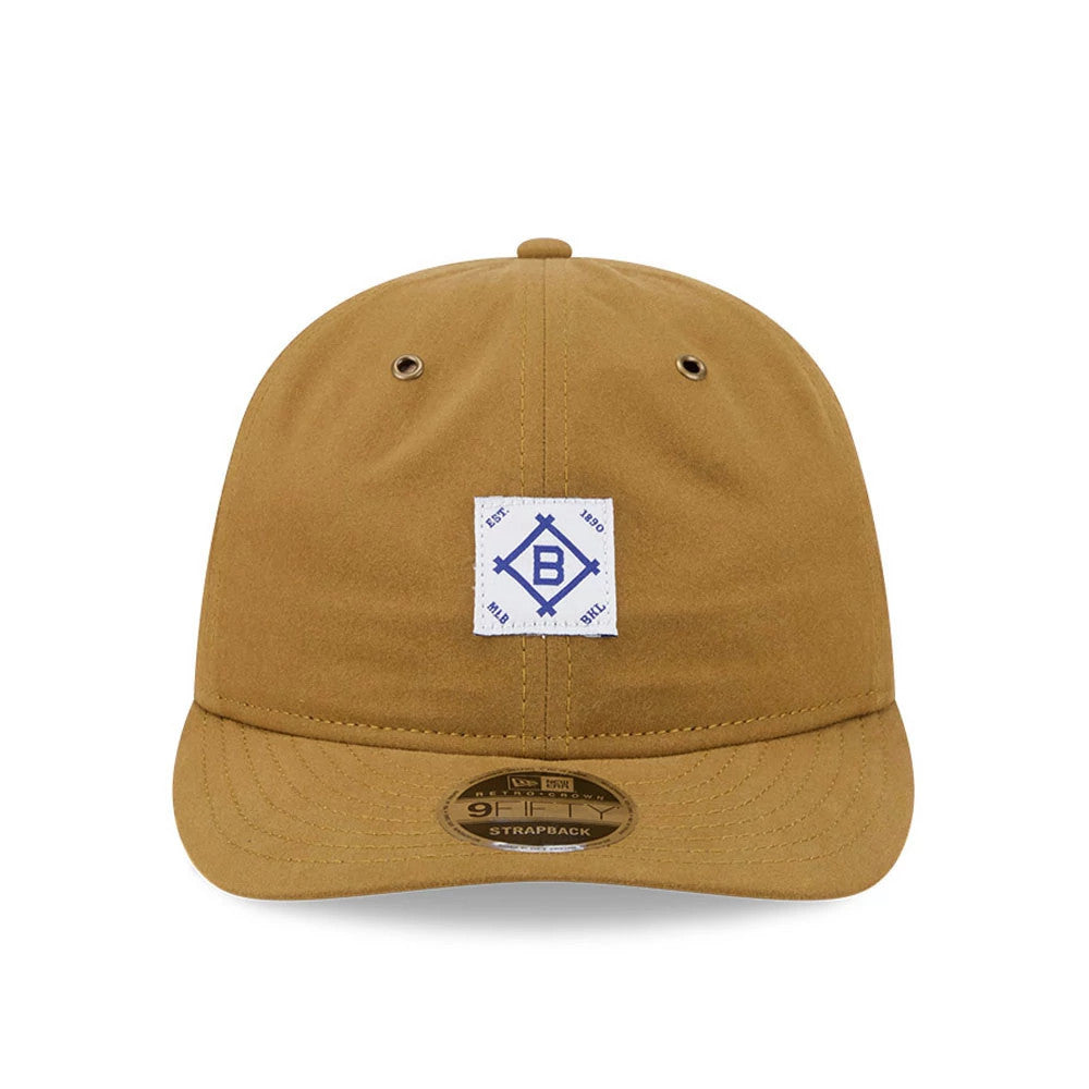 Brooklyn Dodgers MLB Brushed Dark Beige New Era Retro Crown 9FIFTY Adjustable Cap, front view showing a white and blue Brooklyn B graphic patch on the front panel, a curved visor, and a 9FIFTY size sticker on the visor.