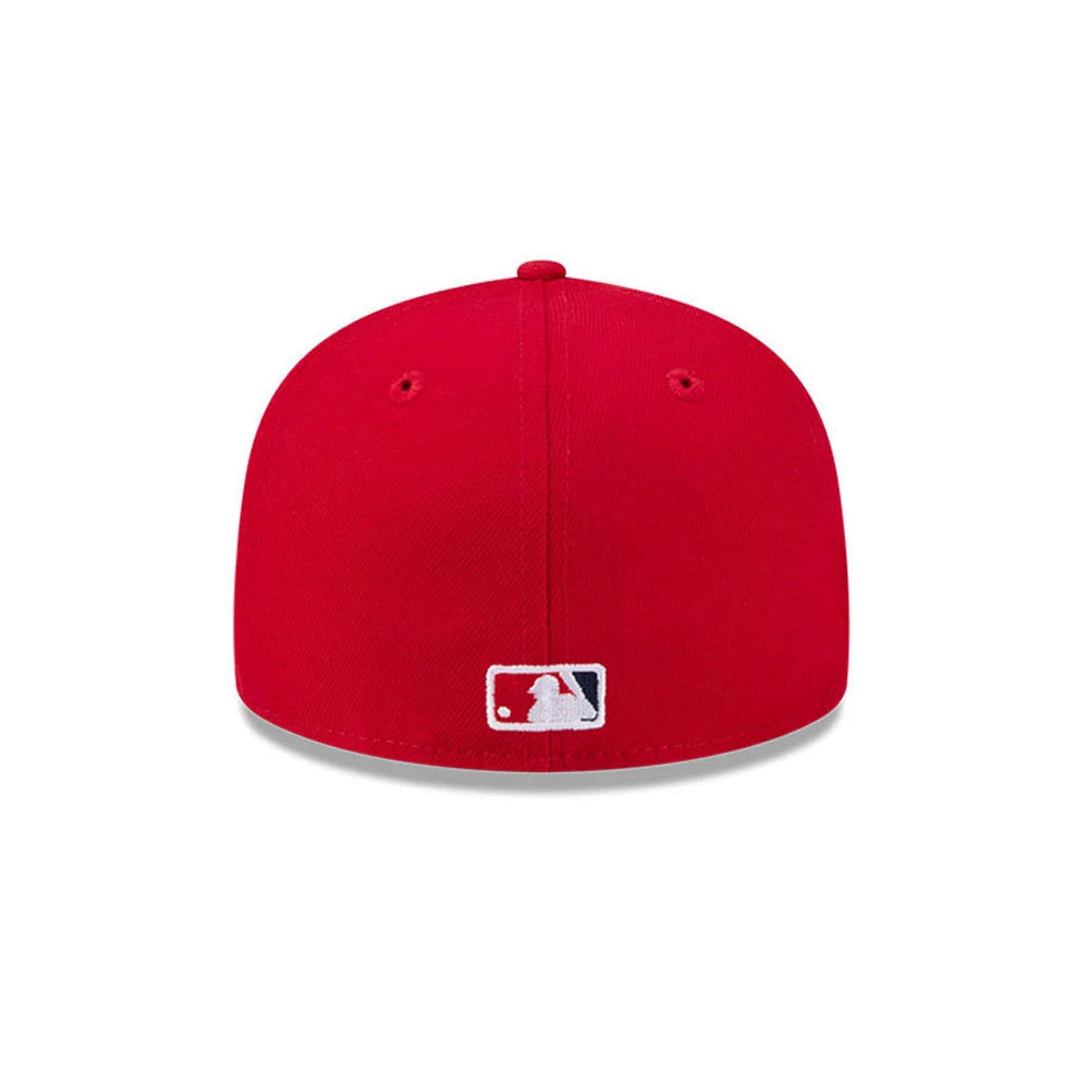 LA Angels MLB Hidden Hit Red New Era 59FIFTY Fitted Cap, rear view showing the MLB Batterman logo embroidered in white and blue at the centre of the back panels, with a red structured crown and matching eyelets.