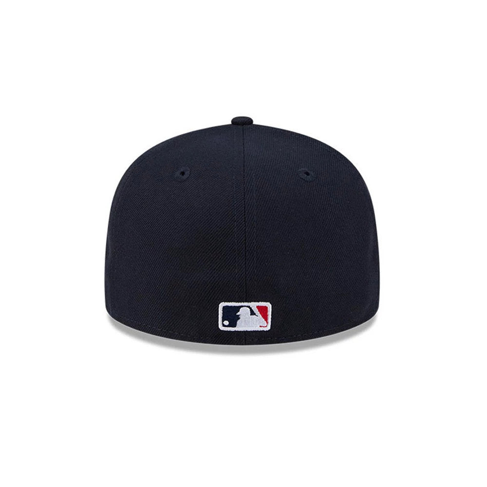 Boston Red Sox MLB Hidden Hit Navy New Era 59FIFTY Fitted Cap, rear view showing the white embroidered MLB Batterman logo at the centre of the back panels, set low on the structured navy crown.