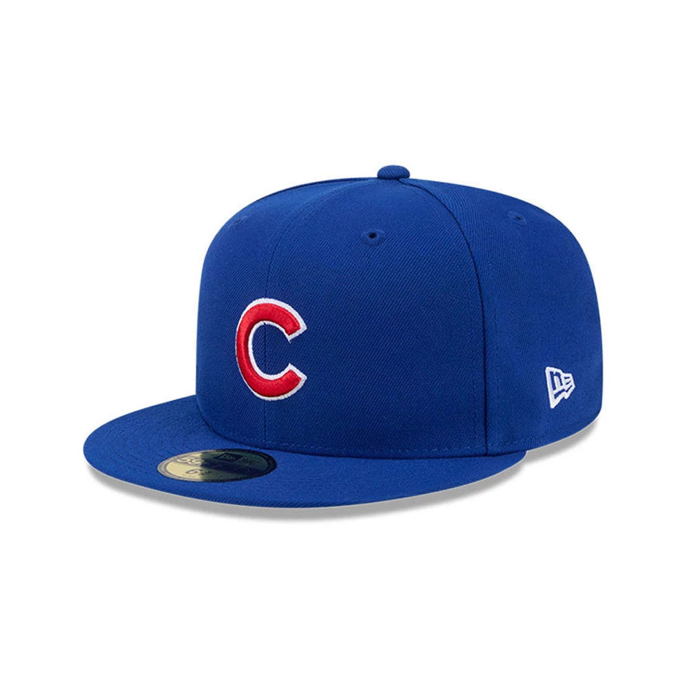 Chicago Cubs MLB Hidden Hit Blue New Era 59FIFTY Fitted Cap, three-quarter view showing the red and white embroidered C logo on the front panel, a flat blue visor with gold 59FIFTY size sticker, and New Era flag logo on the left side.