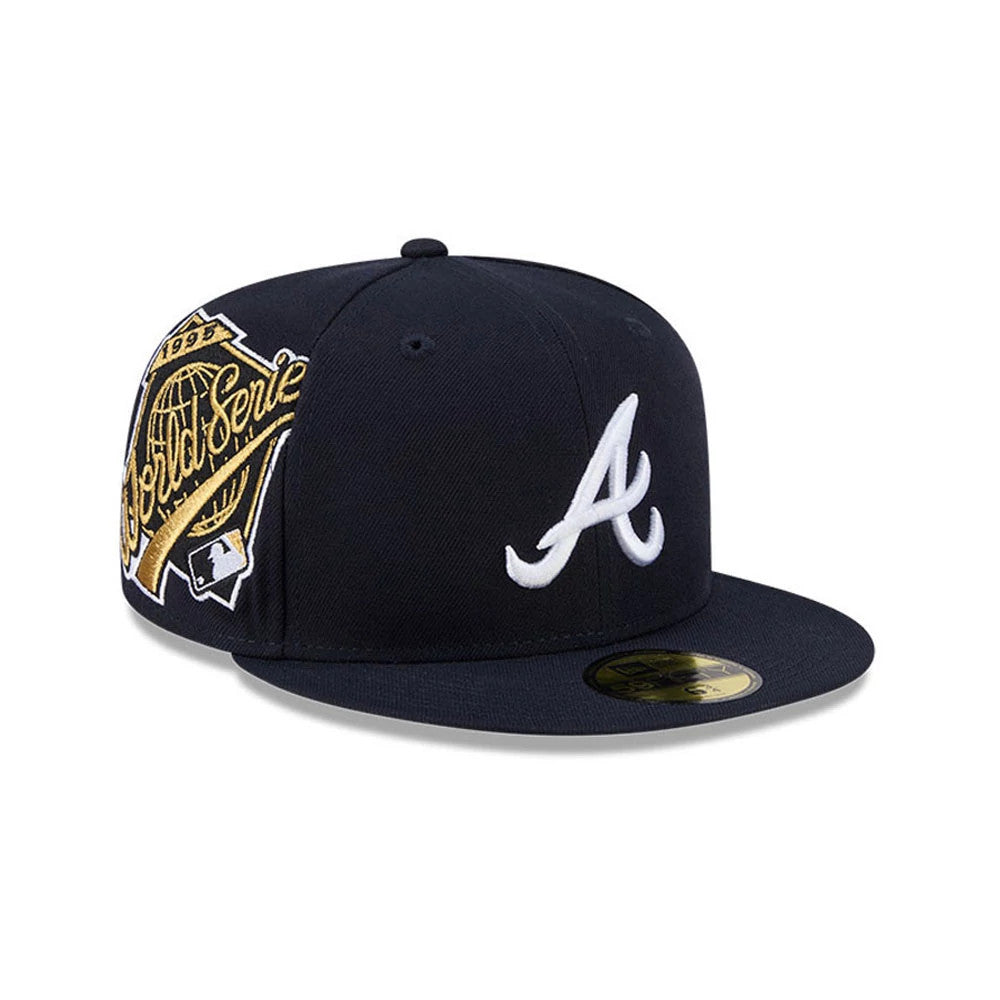 Atlanta Braves MLB Hidden Hit Navy New Era 59FIFTY Fitted Cap, three-quarter view showing a large white embroidered A logo on the front panel, gold 1995 World Series side patch and gold 59FIFTY size sticker on the flat navy visor.
