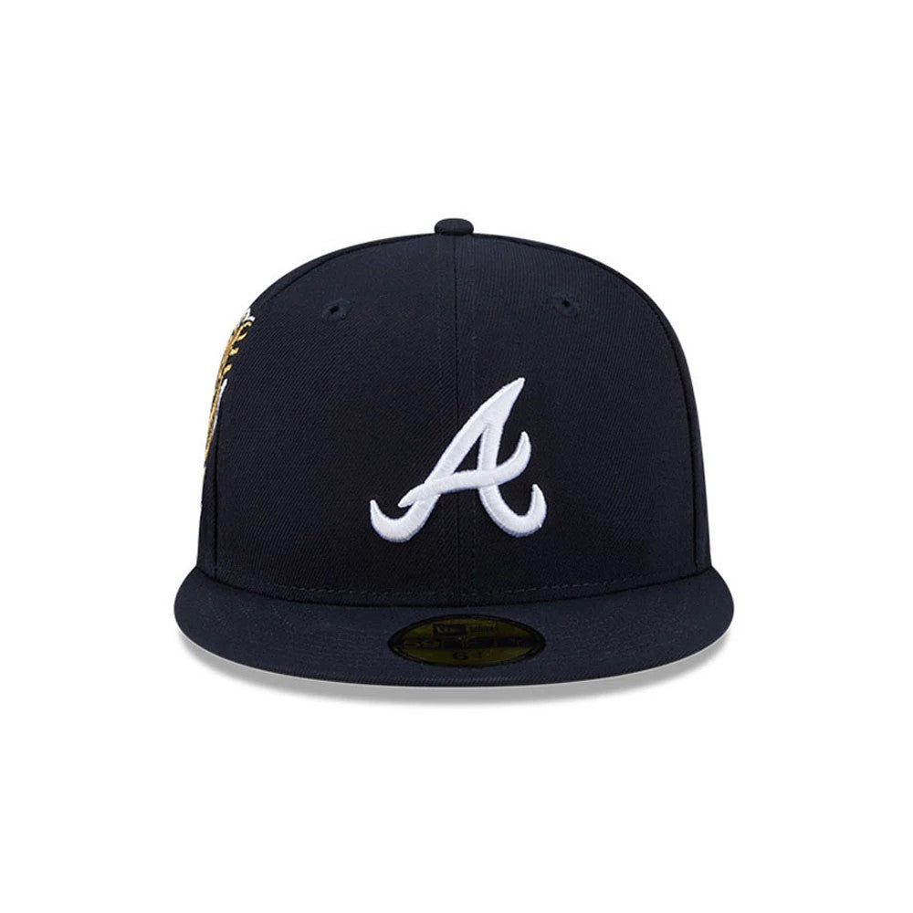 Atlanta Braves MLB Hidden Hit Navy New Era 59FIFTY Fitted Cap, front view showing the white raised embroidered A logo on the navy front panel, complemented by a matching navy flat visor with a gold 59FIFTY size sticker.