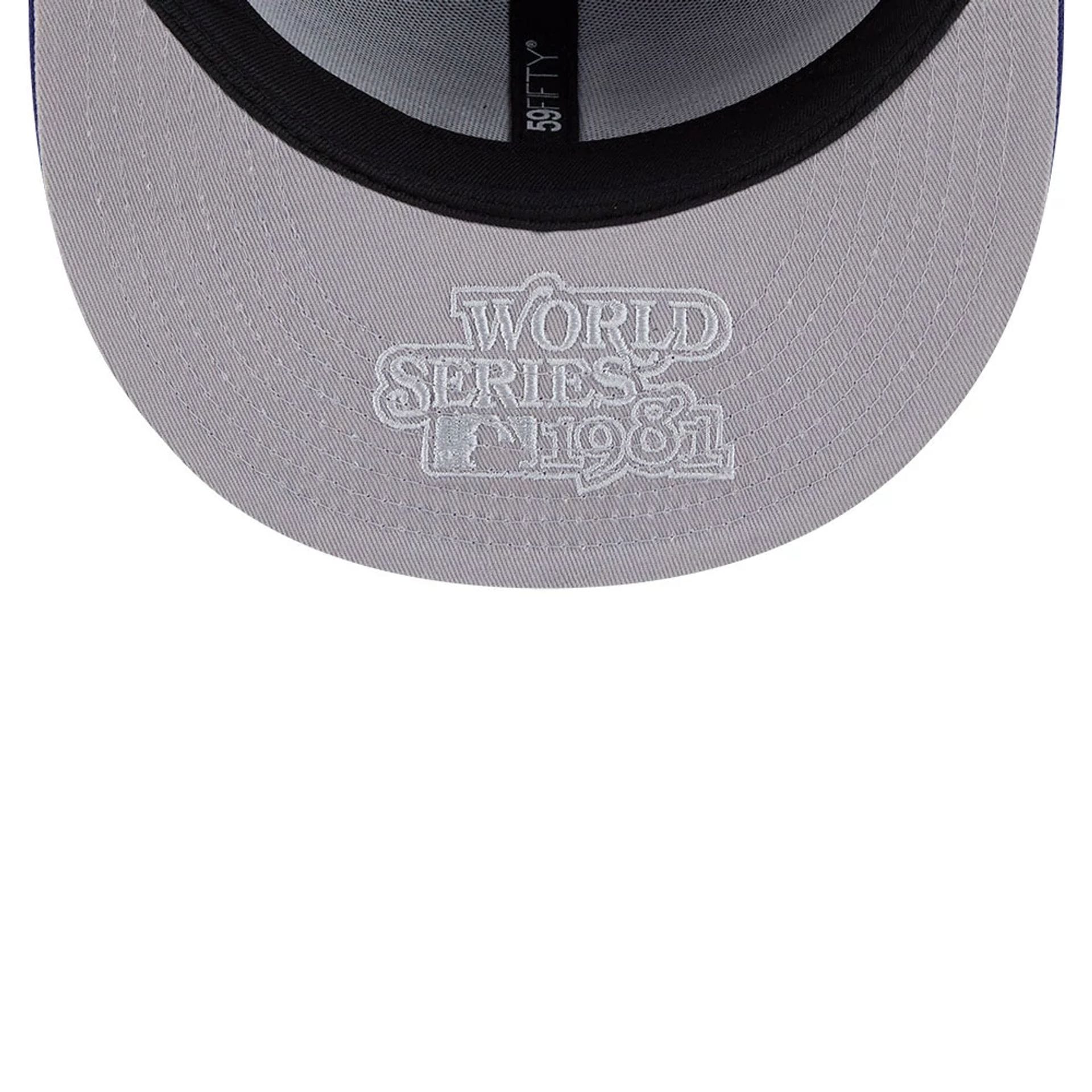 Pictured is this MLB Hidden Hit LA Dodgers 59FIFTY Fitted cap in dark blue. 2