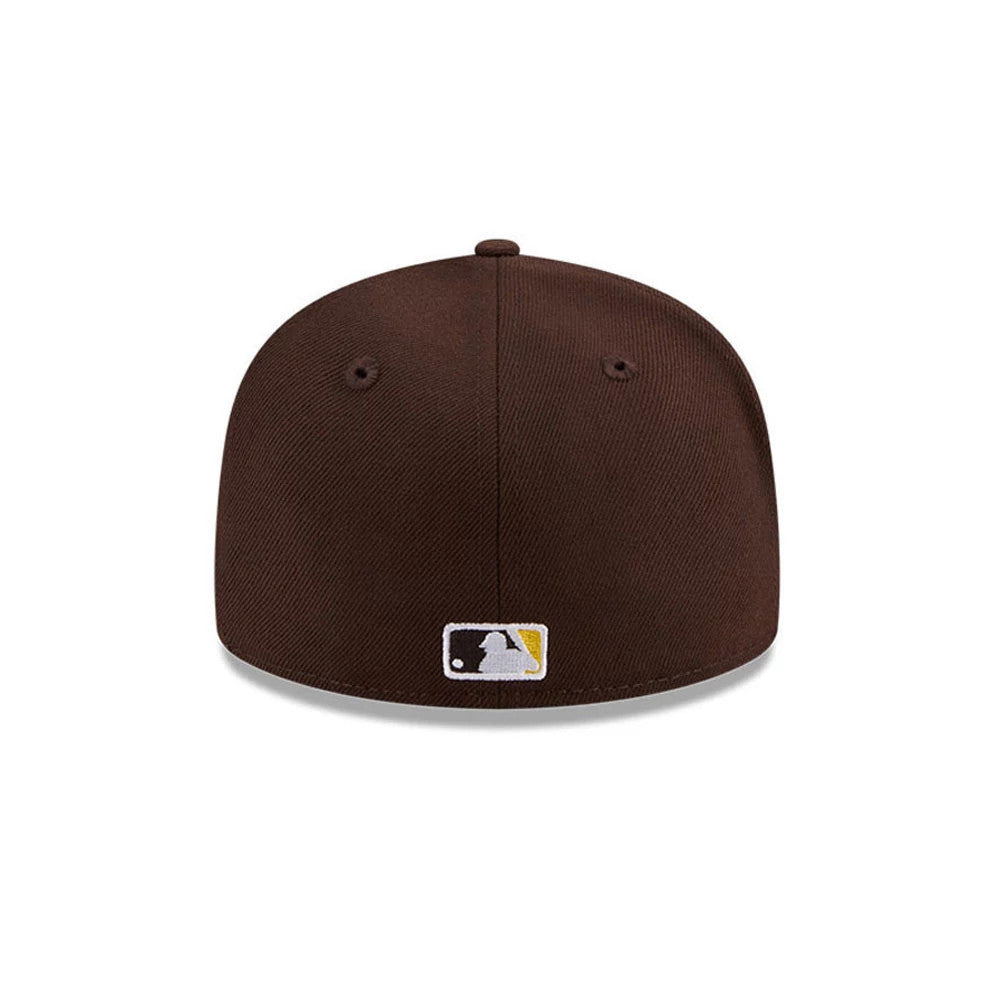 San Diego Padres MLB Hidden Hit Dark Brown New Era 59FIFTY Fitted Cap, rear view showing the embroidered white and gold MLB Batterman logo centred on the back of the structured dark brown crown.