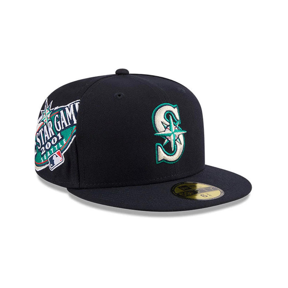 Seattle Mariners MLB Hidden Hit Navy New Era 59FIFTY Fitted Cap, three-quarter view showing the raised teal and white embroidered Mariners logo on the front panel, navy flat visor, gold 59FIFTY size sticker and All-Star Game patch on the right side.