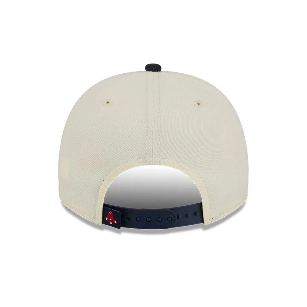 Boston Red Sox MLB Classic Cream New Era 9FIFTY A-Frame Snapback Adjustable Cap, rear view showing the red B logo centred on the navy adjustable strap and cream structured back panels with matching top button and eyelets.