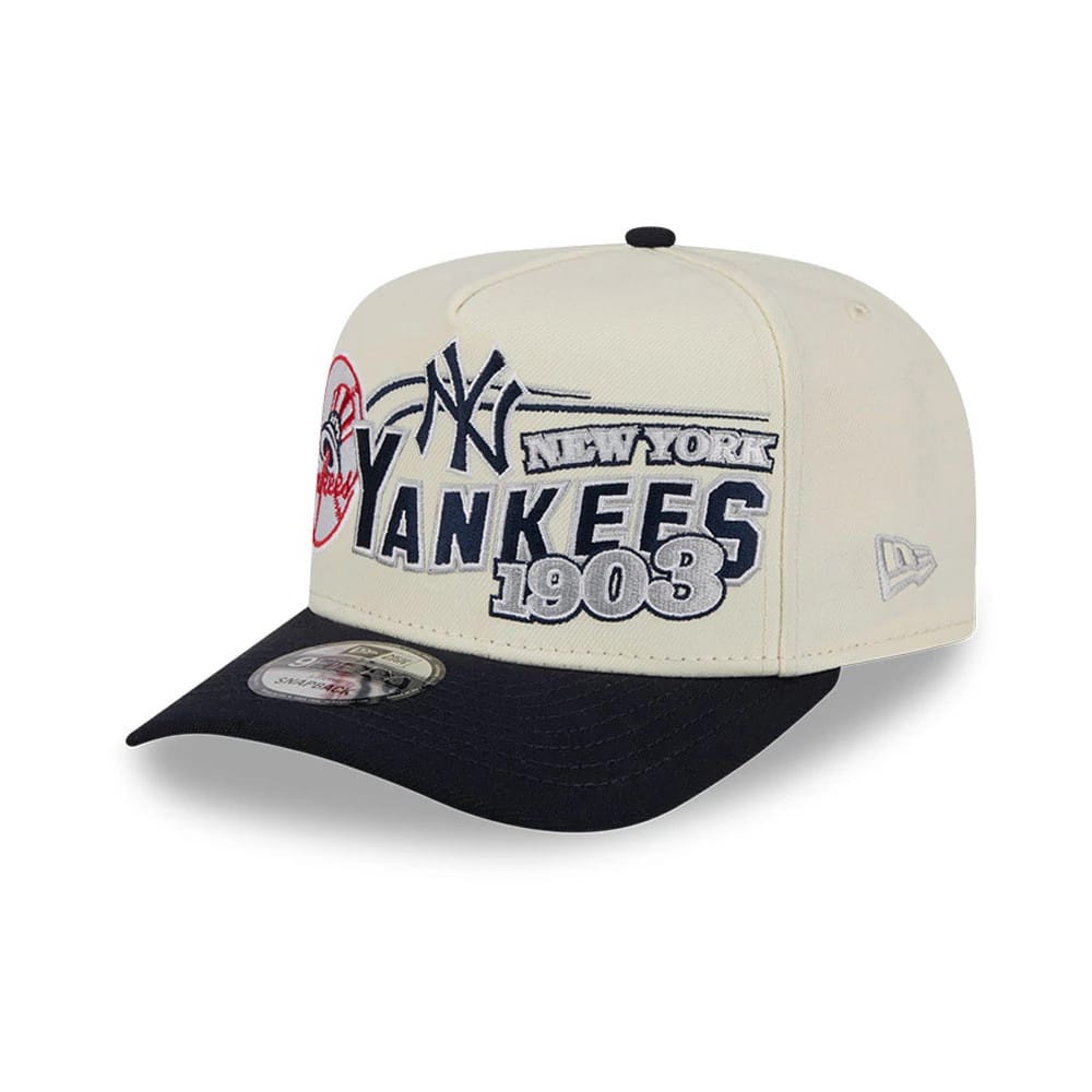 New York Yankees MLB Classic Cream New Era 9FIFTY A-Frame Snapback Adjustable Cap, three-quarter view showing raised navy embroidered Yankees logo and 1903 text on front panel, with black visor and 9FIFTY size sticker, and red side patch.