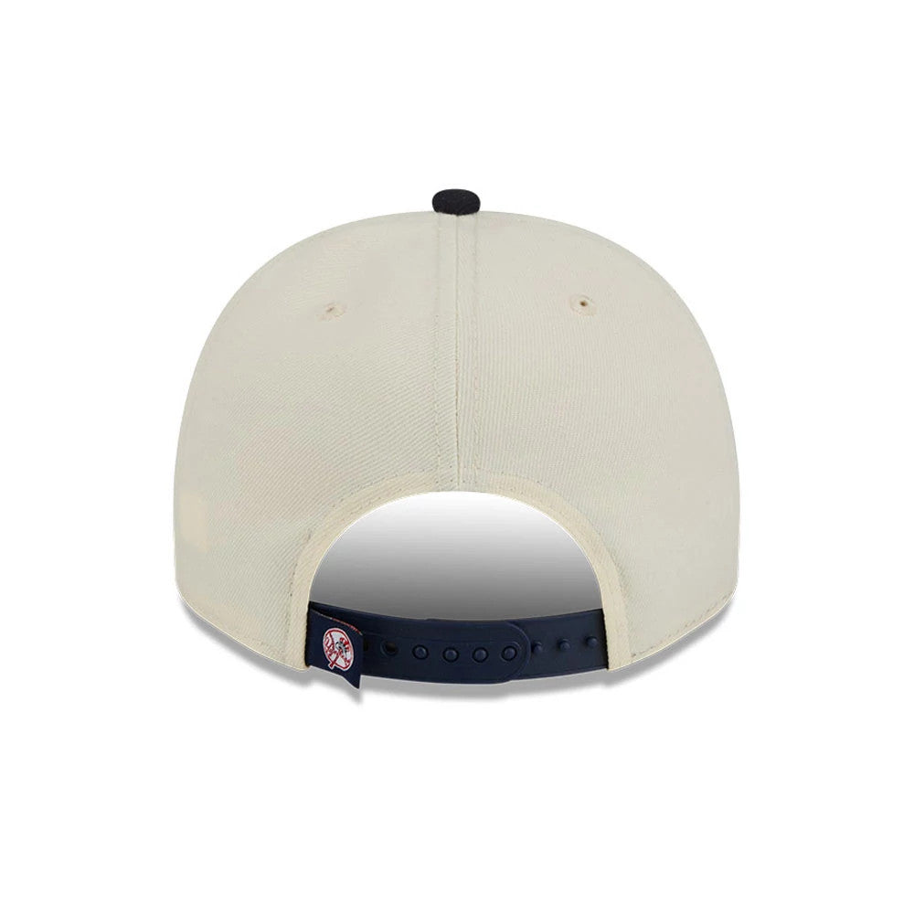 New York Yankees MLB Classic Cream New Era 9FIFTY A-Frame Snapback Adjustable Cap, rear view showing the embroidered Yankees logo on the navy adjustable strap and the cream structured crown with a black top button.