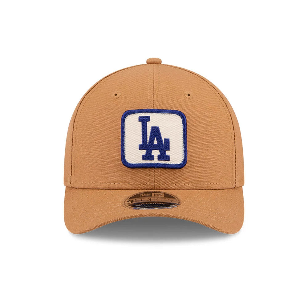 LA Dodgers MLB Team Choice Beige New Era 9FORTY M-Crown Adjustable Cap, front view showing a blue LA logo embroidered on a white square patch on the centre front panel with a brown curved visor and a 9FORTY size sticker.