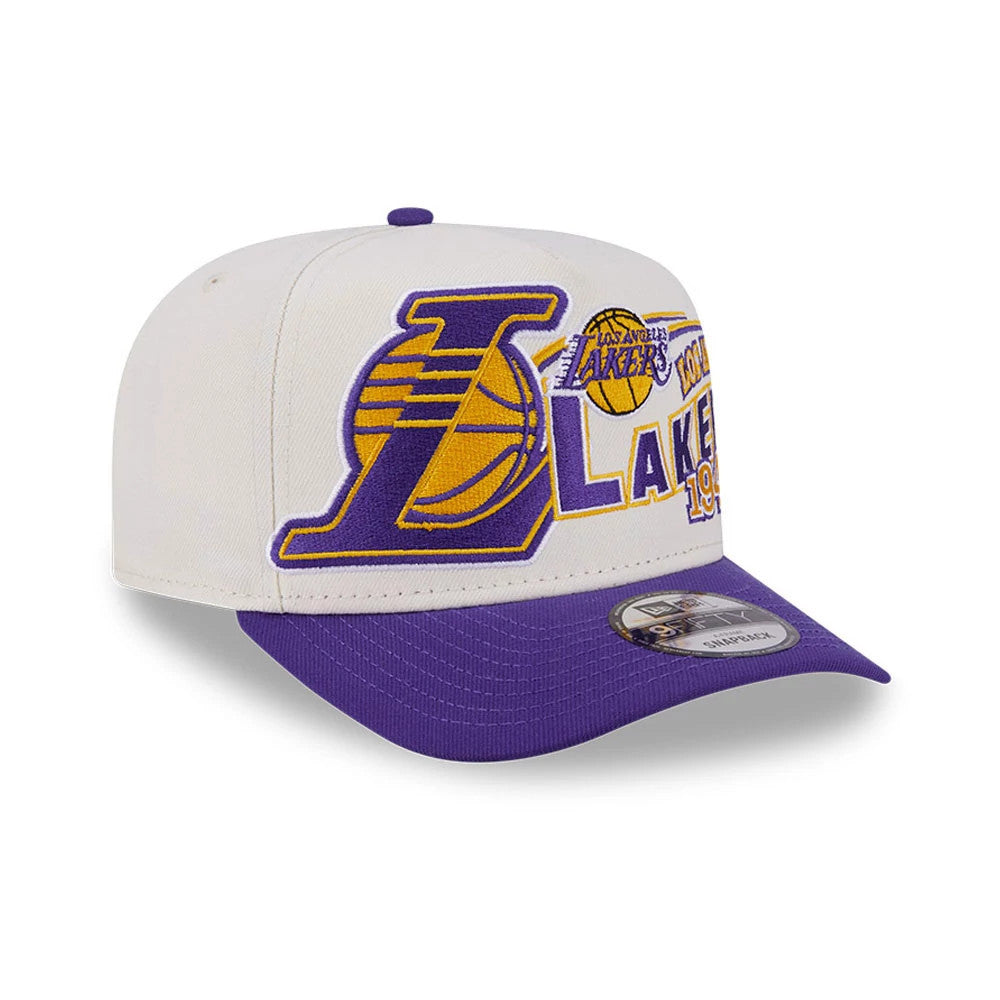 LA Lakers NBA Classic White New Era 9FIFTY A-Frame Snapback Adjustable Cap, three-quarter view showing the large embroidered purple and gold Lakers logo on the front panel, with a curved purple visor and a 9FIFTY size sticker.