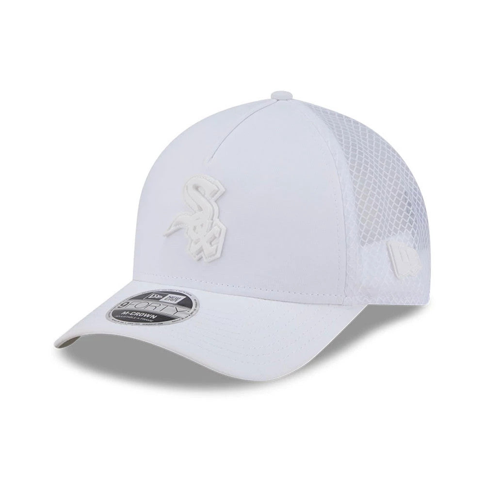 Chicago White Sox MLB Badged White New Era 9FORTY M-Crown A-Frame Trucker Cap, three-quarter view showing the white embroidered Sox logo on the front panel, curved white visor with the 9FORTY size sticker, and mesh back panels with New Era flag logo.