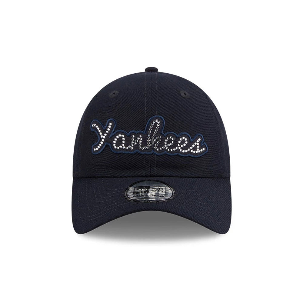 New York Yankees MLB Rhinestone Navy New Era Casual Classic Adjustable Cap, front view showing the rhinestone-encrusted Yankees script logo in white embroidery on the structured navy crown, with a curved visor and 9FORTY size sticker.