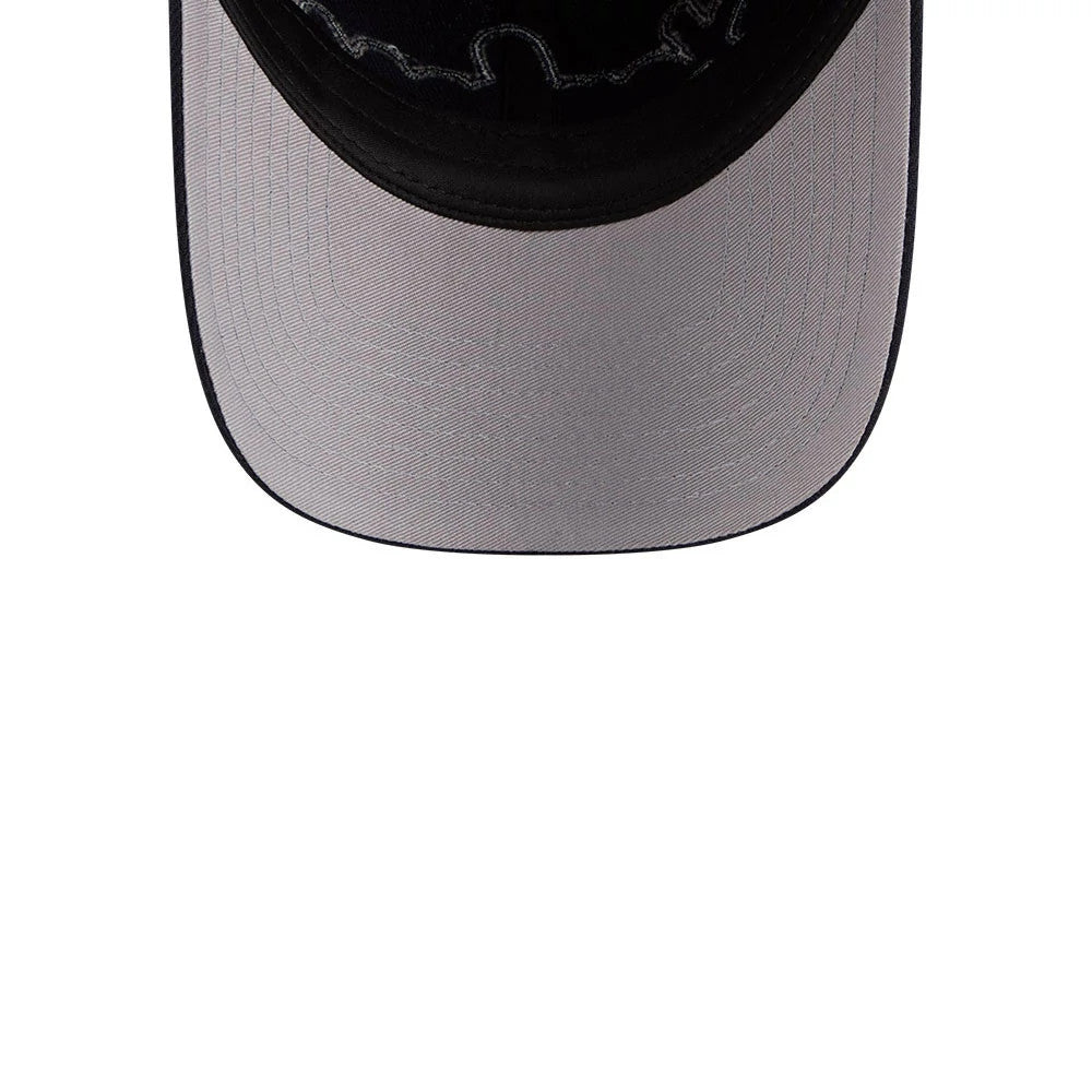 New York Yankees MLB Rhinestone Navy New Era Casual Classic Adjustable Cap, inside view showing the grey undervisor, black interior sweatband, and dark stitching on the inside of the structured crown.