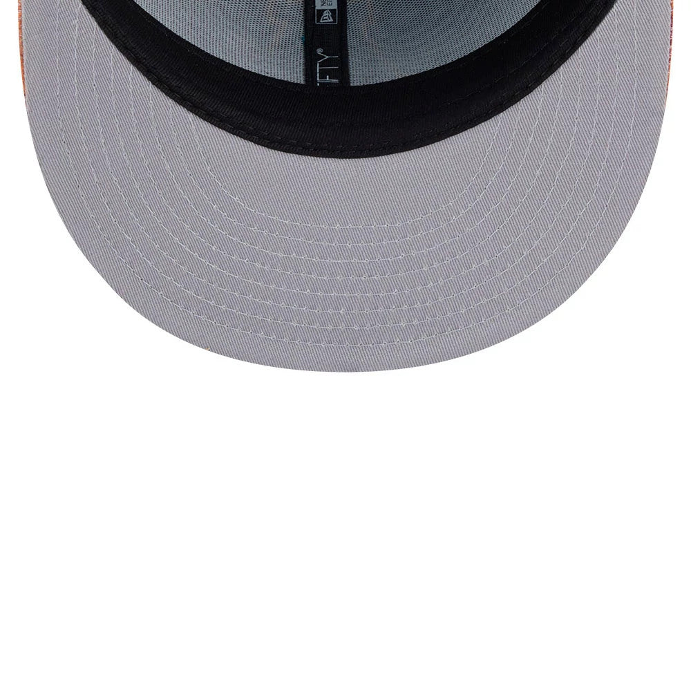 Hey Arnold Letterman Turquoise New Era 59FIFTY Fitted Cap, inside view showing a grey undervisor, black sweatband with woven taping along it and white stitching detail, enhancing the cap's structured design.