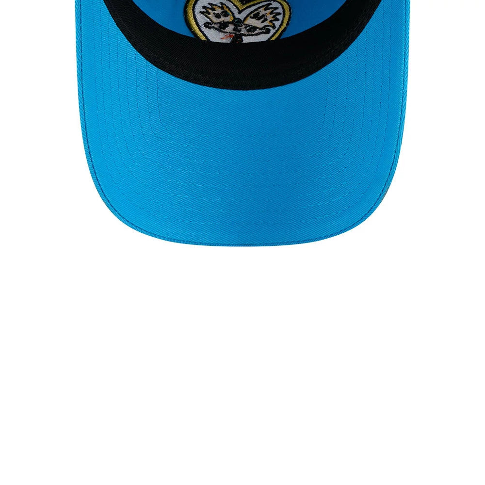 Hey Arnold Heart Blue New Era 9TWENTY Adjustable Cap, inside view showing the light blue undervisor and a unique heart graphic with a character’s face on the sweatband, against a contrasting black interior.