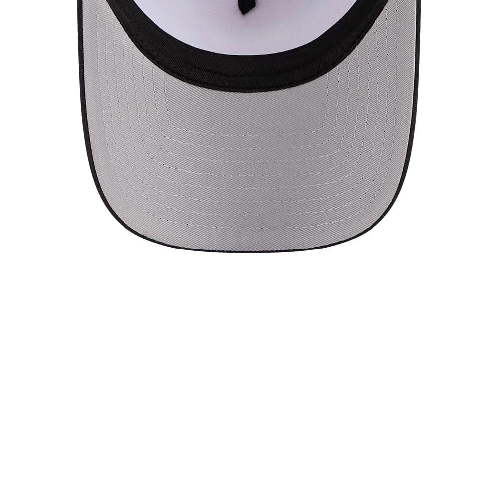 Hey Arnold Graphic Black New Era 9FORTY A-Frame Trucker Adjustable Cap, underside view showing the grey undervisor and black stitching detail surrounding the curved visor, accentuating the white mesh lining underneath.
