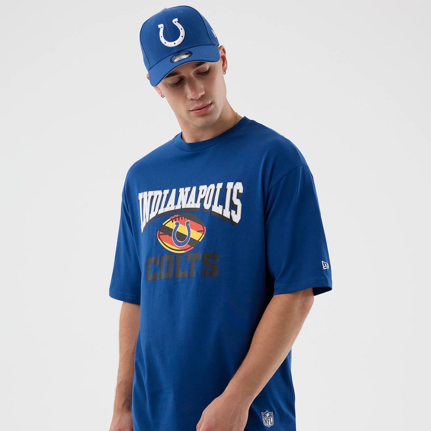 The Male model is wearing Indianapolis Colts NFL International Series Games Blue Oversized T-Shirt 7