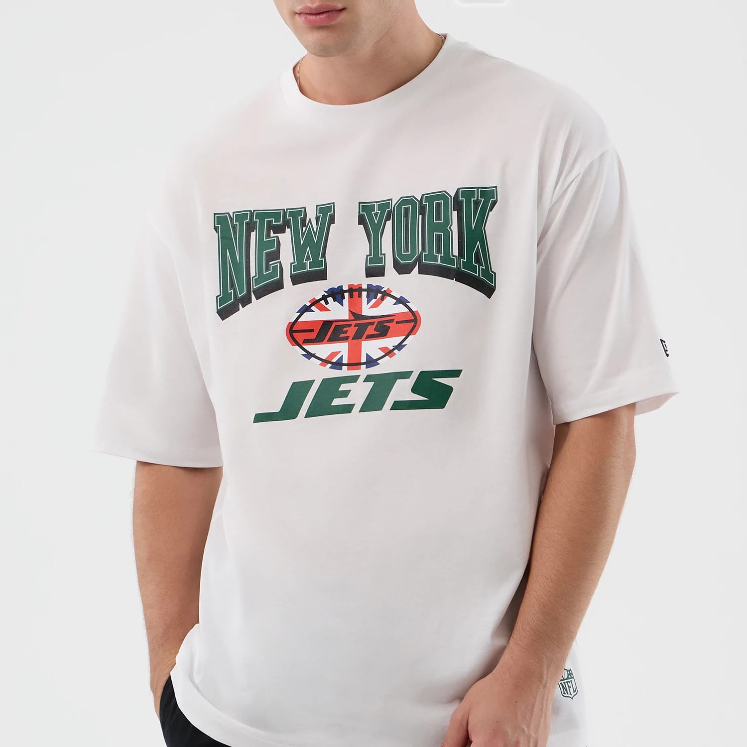 The Male model is wearing New York Jets NFL International Series Games White Oversized T-Shirt 3