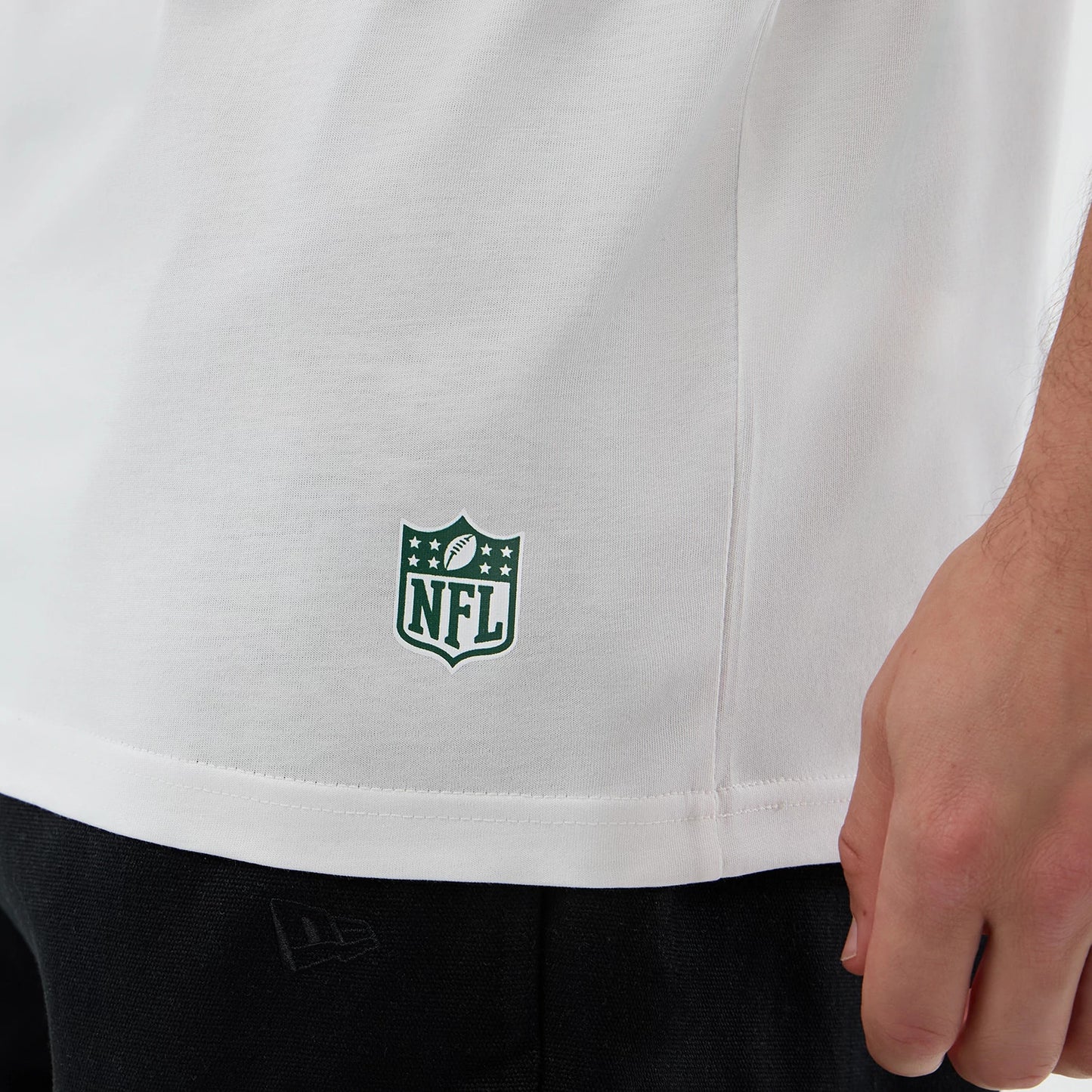 The Male model is wearing New York Jets NFL International Series Games White Oversized T-Shirt 7